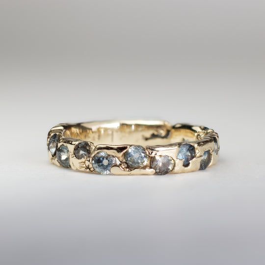 Antique Gold Forged Ring with Inlaid Bluish Crystals