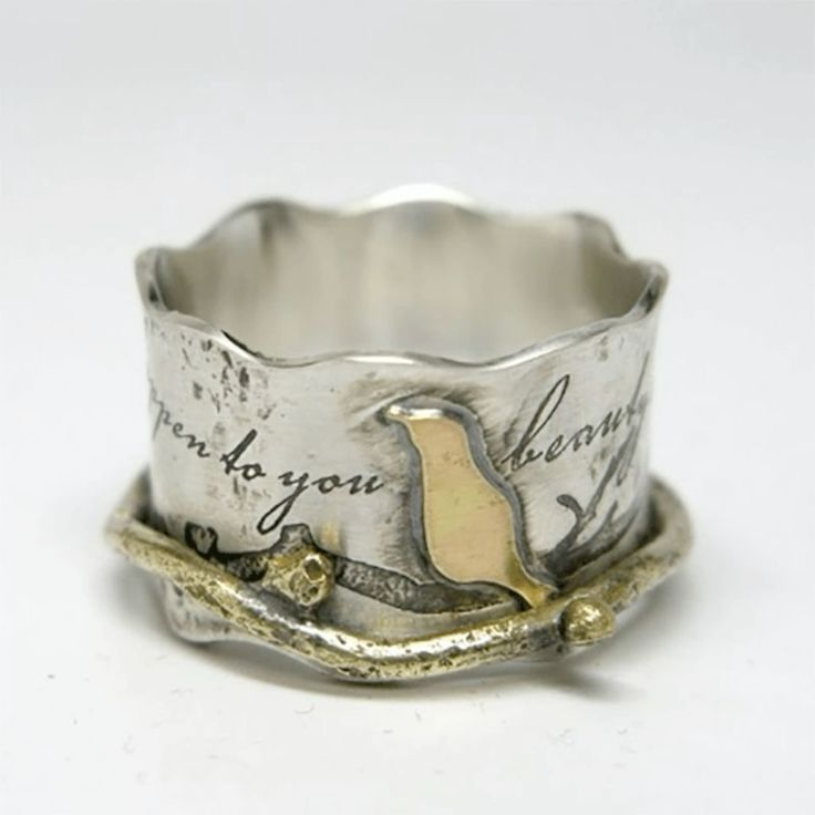 Antique Silver Ring with Vintage Golden Bird Design