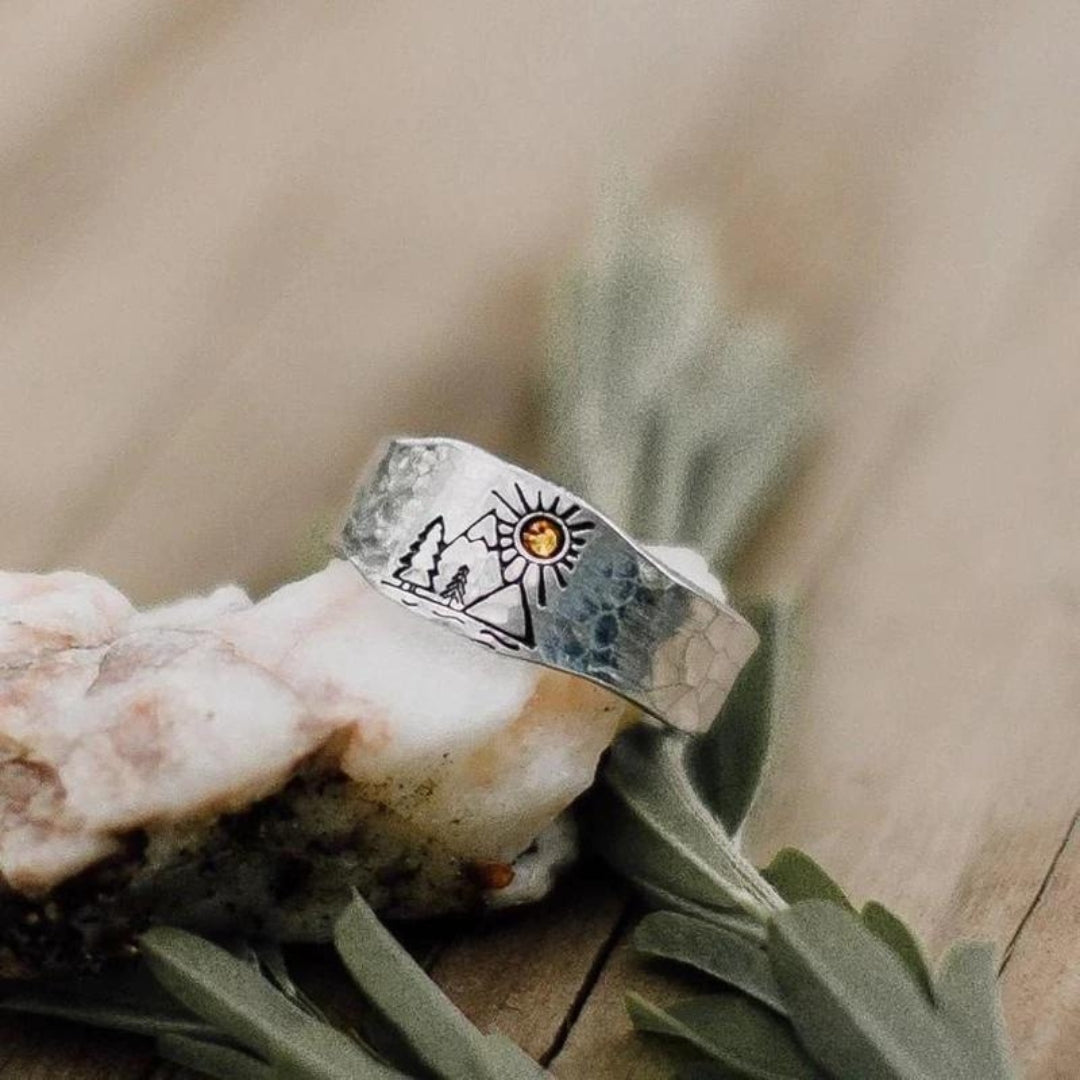 Silver Ring with Sun and Mountain Design