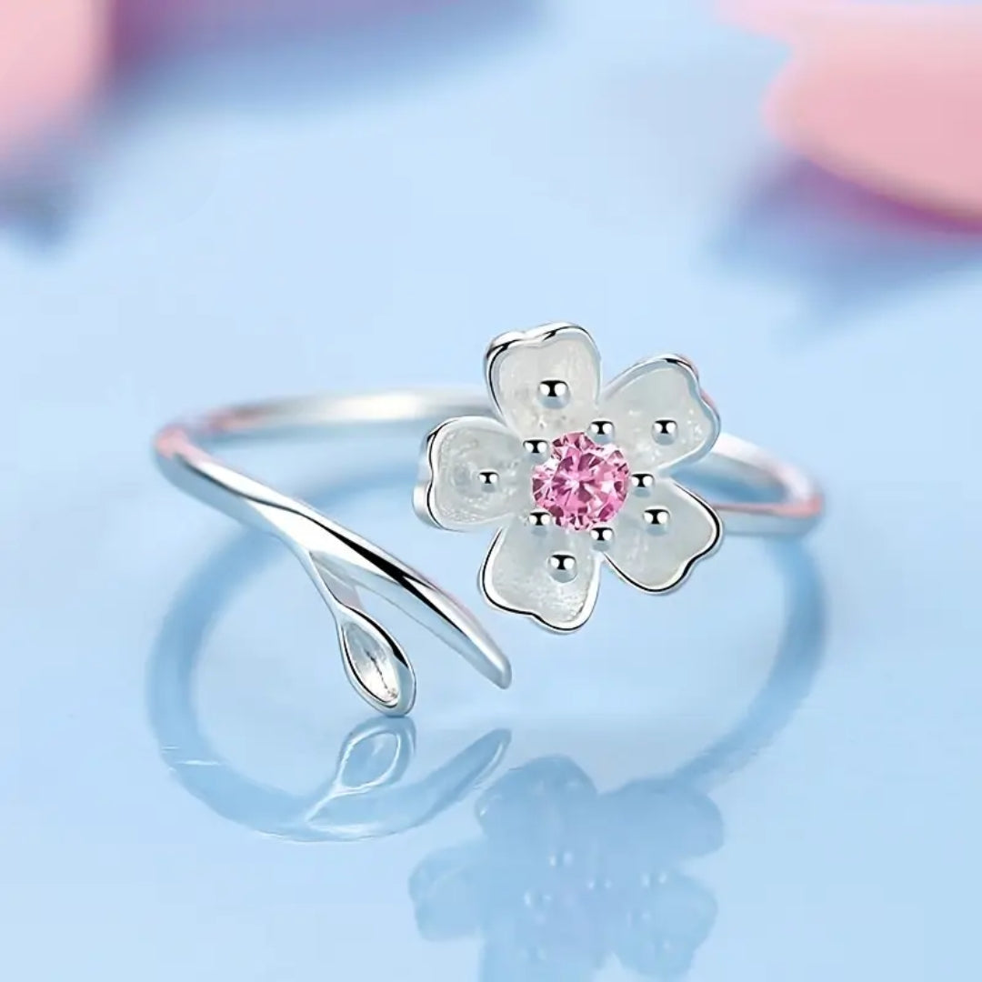 Pink Zirconia Ring with White Blossom Design