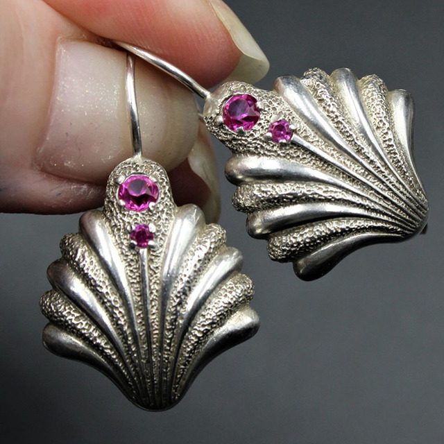 Retro Shell Earrings Adorned with Purple Crystals