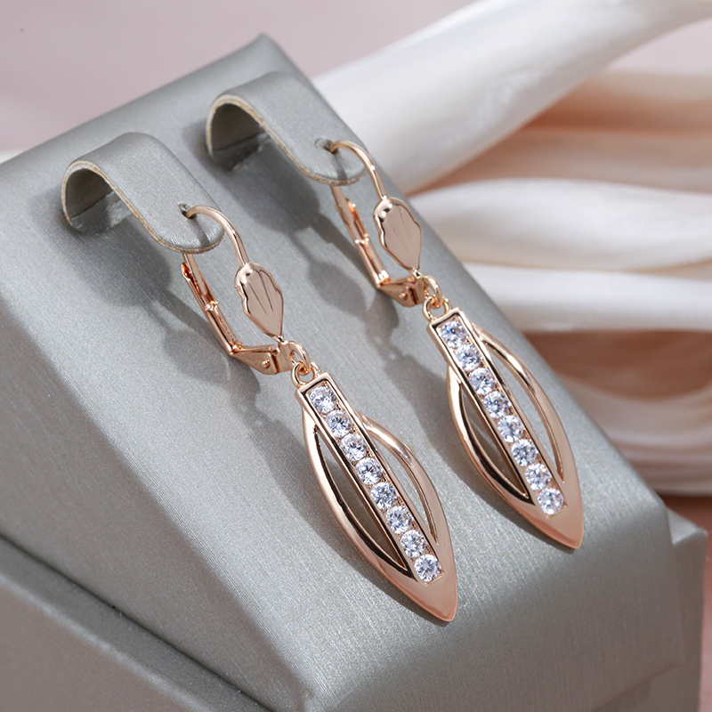 Chic Gold Earrings with Elegant Pointed Zirconia