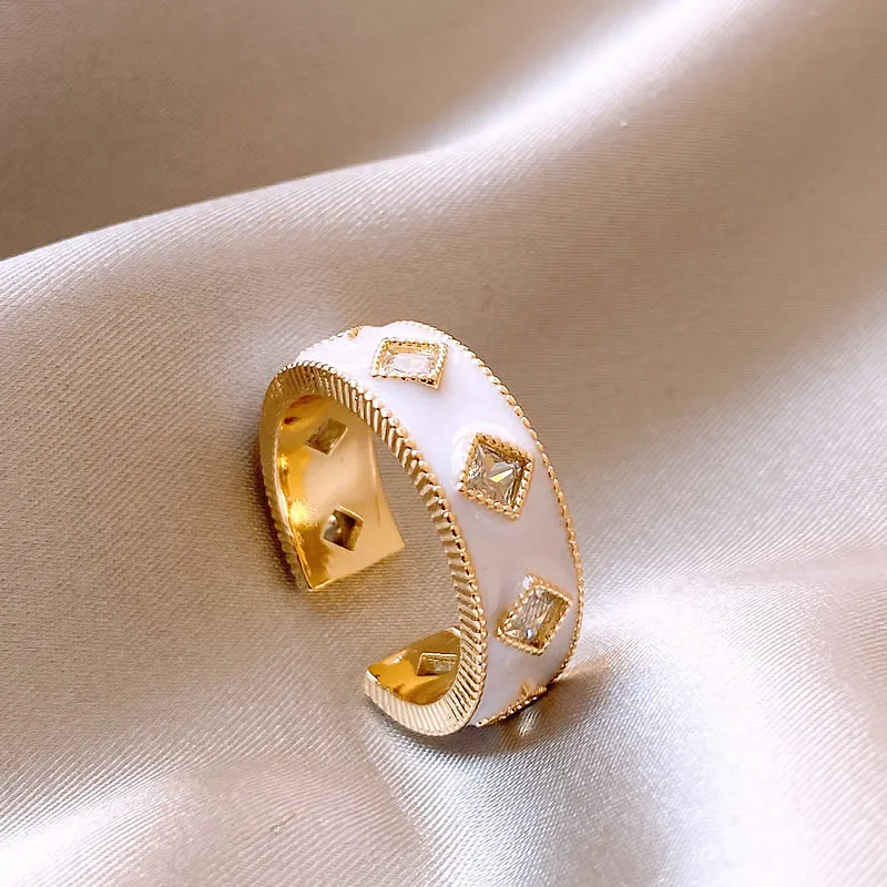 Chic Gold Ring with Elegant White Enamel