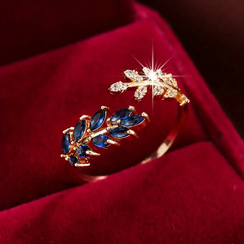 Gold Ring with Open Blue Leaf Zirconia Design