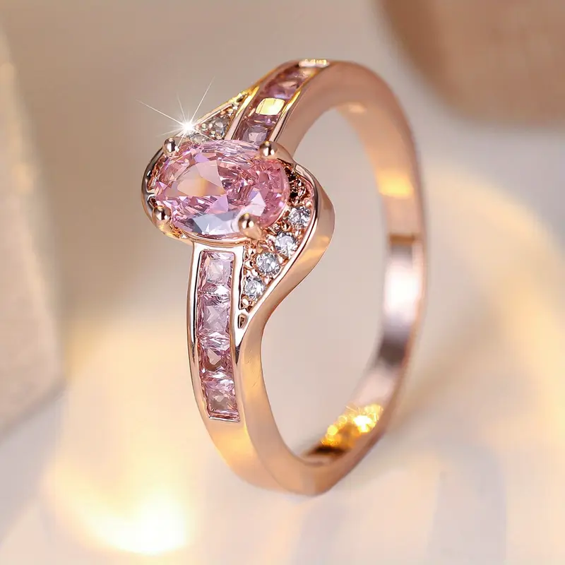 Gold Ring with Pink Crystal Accent