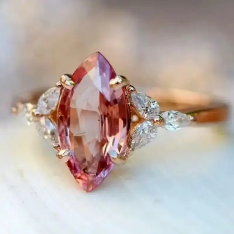 Gold Ring with Oval Orange Zirconia