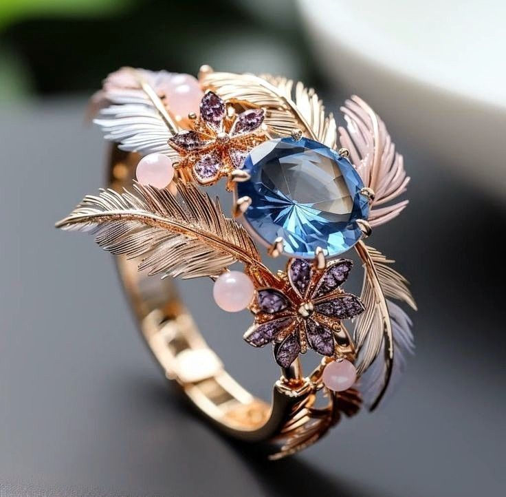 Blue Crystal Ring with Exotic Rose Feather Design