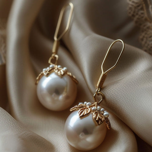 Gold Earrings with Elegant Dangling Pearls