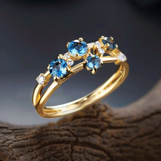 Gold Ring with Inlaid Blue Crystal