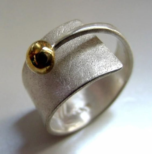 Retro Silver Ring with Open Golden Sphere Design