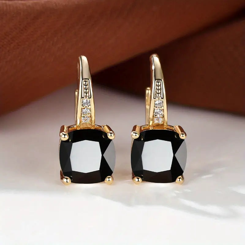 Enchanting Golden Earrings Featuring a Mystical Stone Circle