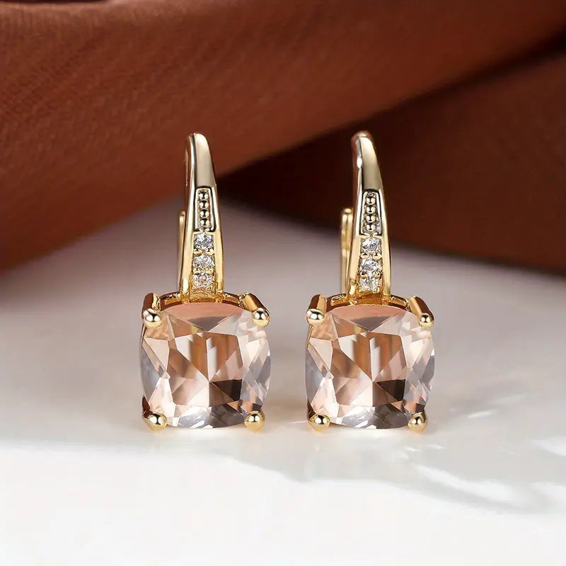 Enchanting Golden Earrings Featuring a Mystical Stone Circle