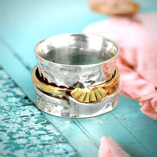 Celestial Spinner Ring: Sun and Moon Design