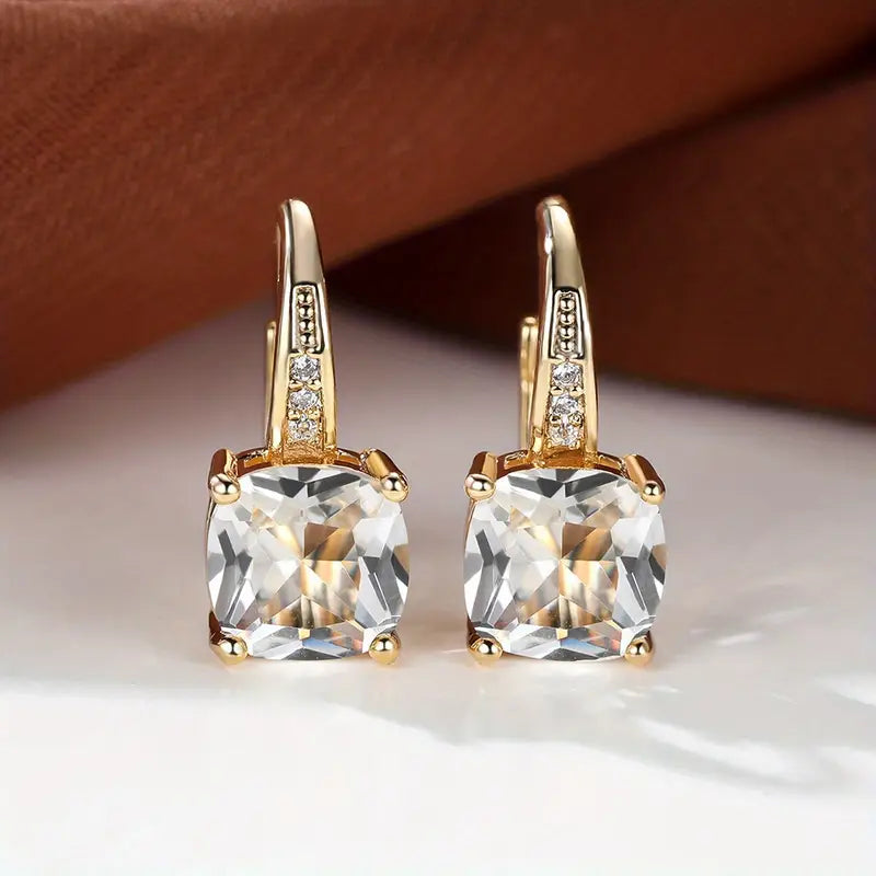 Enchanting Golden Earrings Featuring a Mystical Stone Circle