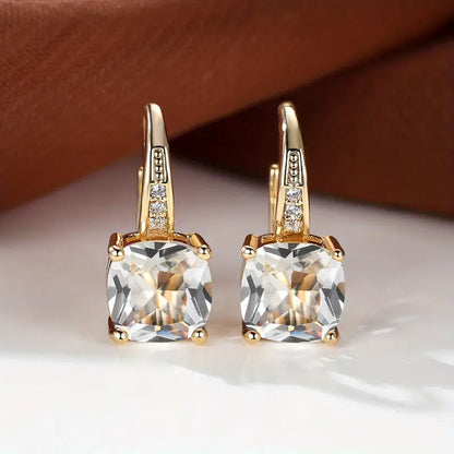 Enchanting Golden Earrings Featuring a Mystical Stone Circle