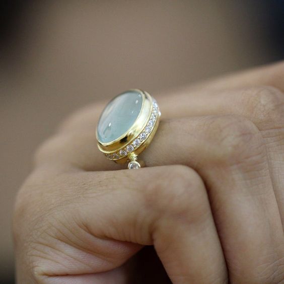 Classic Round Moonstone Ring with Intricate Inlay