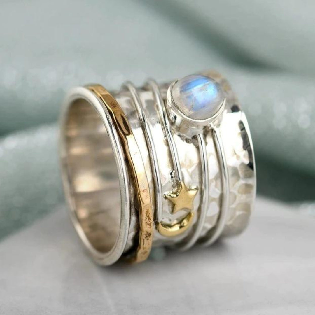 Celestial Moonstone Spinner Ring with Star and Moon Design