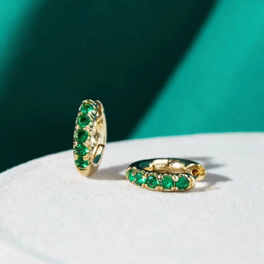 Gold Nut Earrings Featuring Green Zirconia