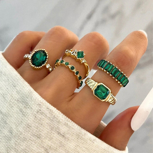 Elegant Gold Rings Adorned with Green Zircons