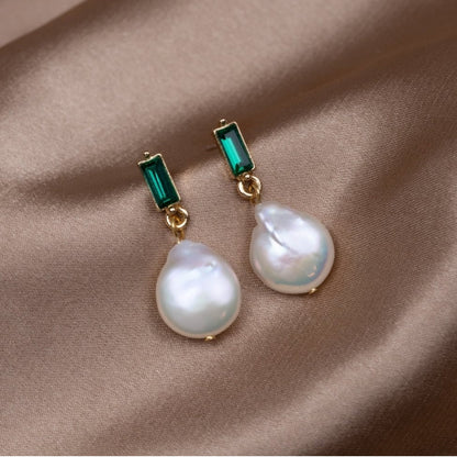 Elegant Gold Earrings Adorned with Pearls and Green Zirconia