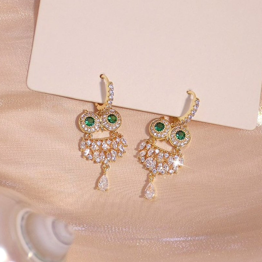 Elegant Gold Owl Earrings Adorned with Green Zirconia