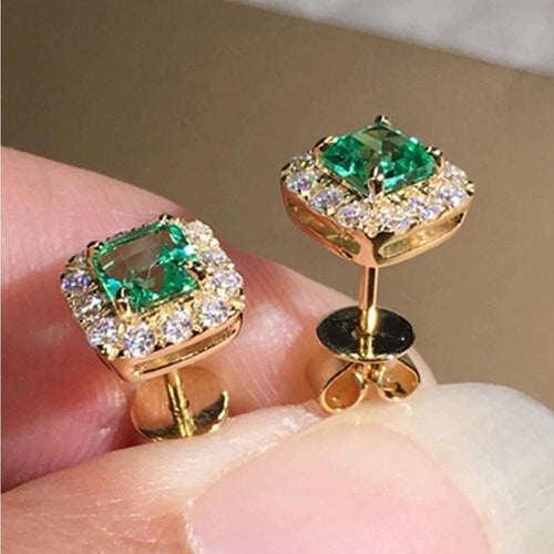 Gold Earrings Adorned with Green Crystals
