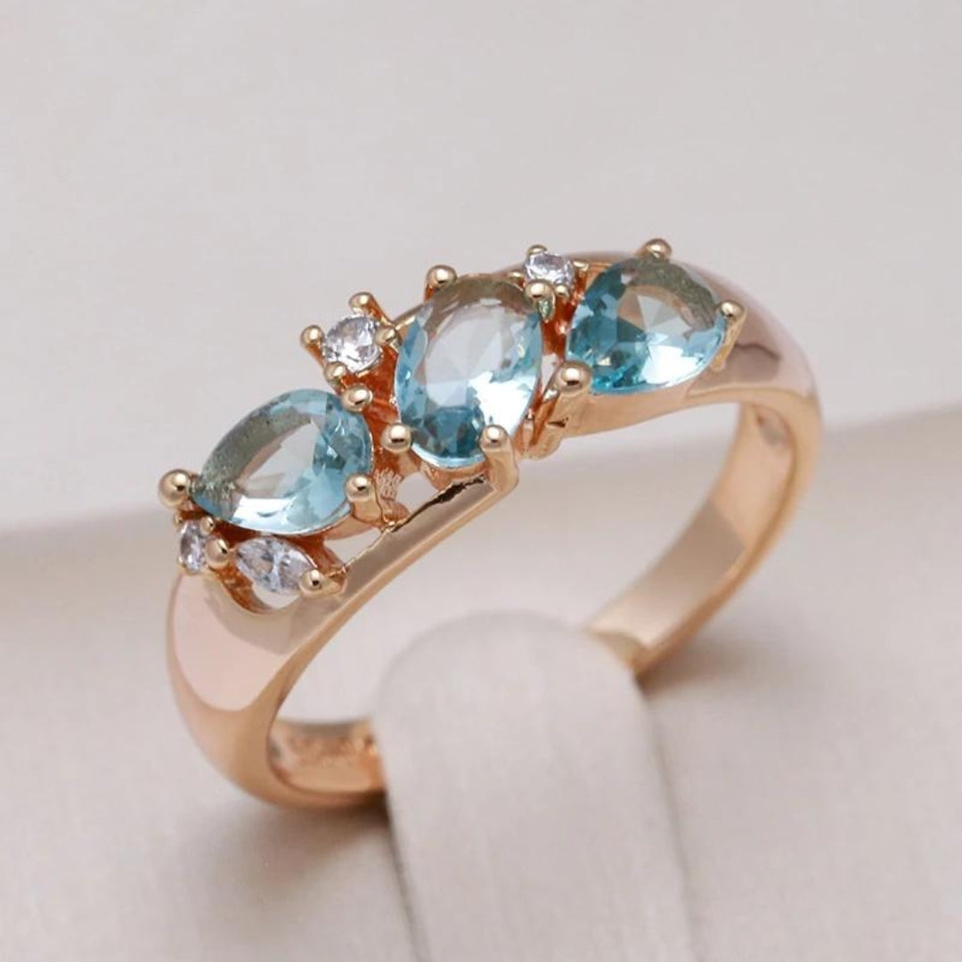 Gold Ring Featuring Blue Zirconia