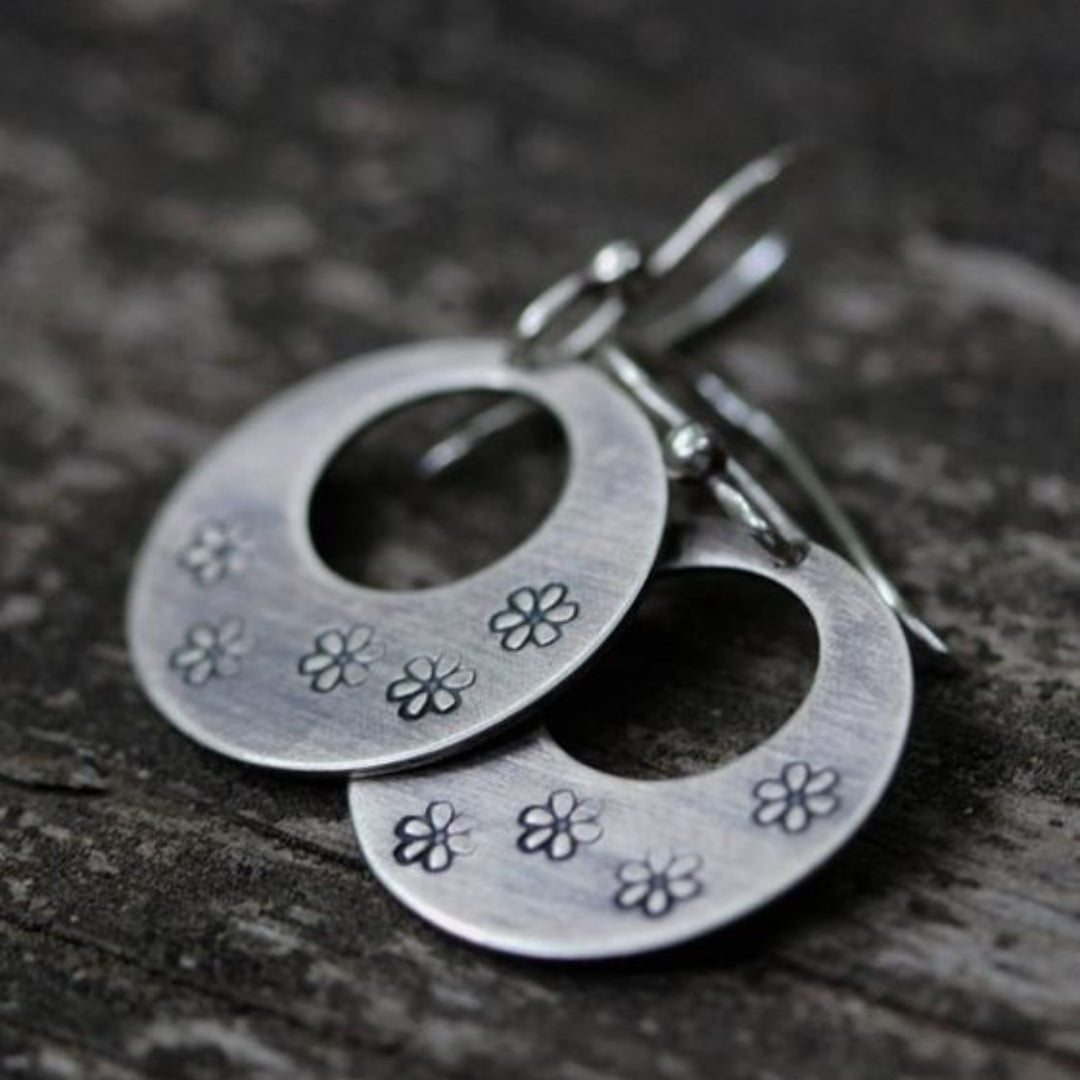 Retro Daisy Hollow Curved Earrings