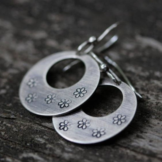 Retro Daisy Hollow Curved Earrings