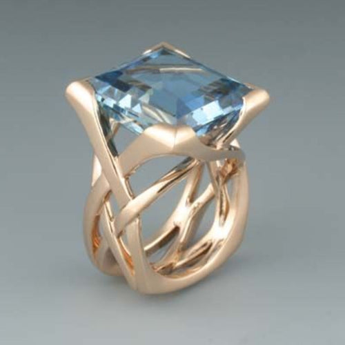 Classic Rose Gold Ring with Blue Zirconia Accent