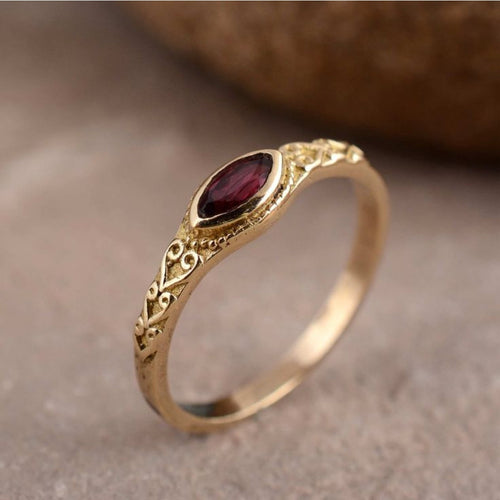 Antique Golden Ring with Inlaid Red Stone