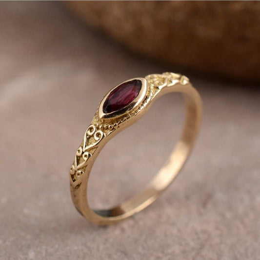 Antique Golden Ring with Inlaid Red Stone