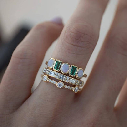 Retro Rings Featuring White and Green Opal