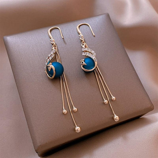 Holiday Earrings Adorned with Blue Beads