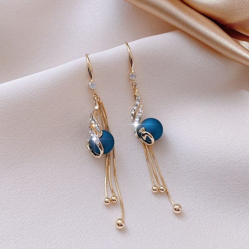 Holiday Earrings Adorned with Blue Beads