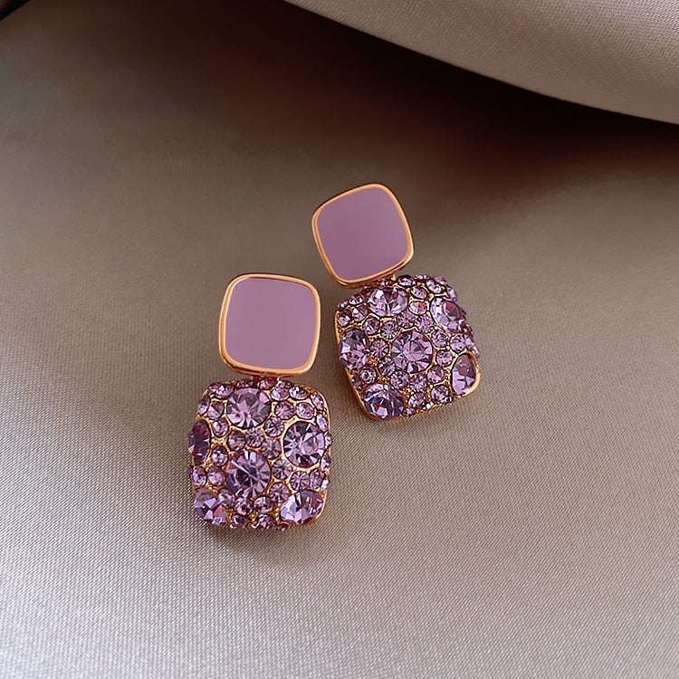 Elegant Purple Earrings Adorned with Zirconia Inlay