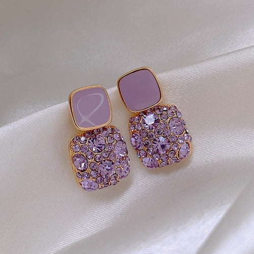 Elegant Purple Earrings Adorned with Zirconia Inlay