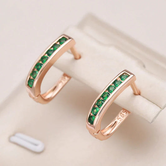 Gold-Set Elegant Earrings Adorned with Green Crystals