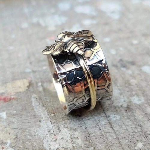 Silver Ring with Golden Bee Thread Design