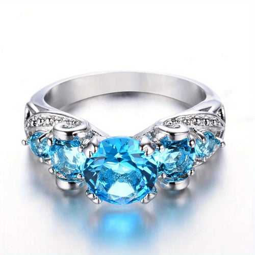 Silver Ring with Blue Oval Crystal