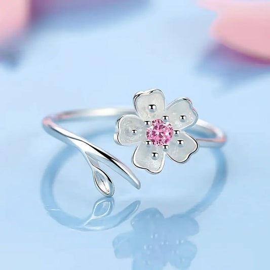 Pink Zirconia Ring with White Blossom Design