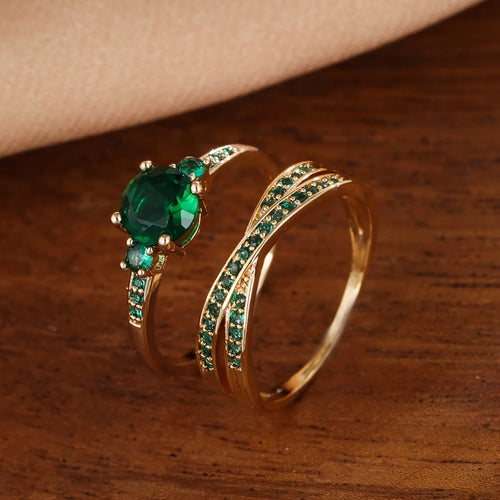 Gold Ring Set with Inlaid Green Crystal