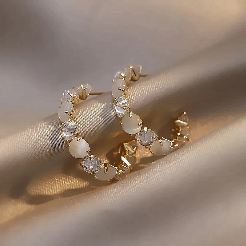 Elegant Gold Earrings with White Opal and Crystal Accents