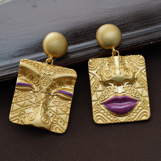 Retro Gold Tone Face Earrings