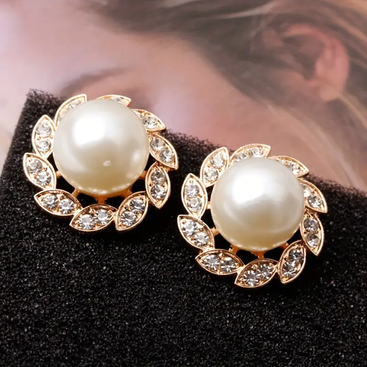 Chic Pearl Earrings with Gleaming Leaf Accents