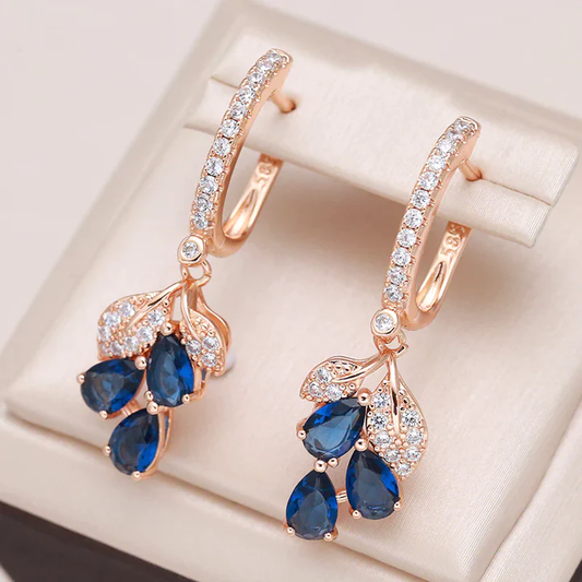 Chic Gold Earrings with Elegant Blue Crystals