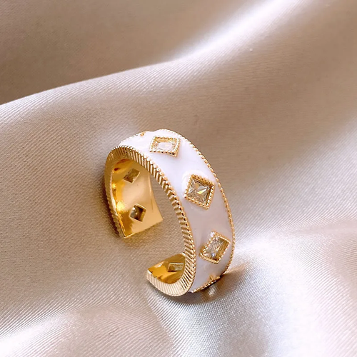 Chic Gold Ring with Elegant White Enamel