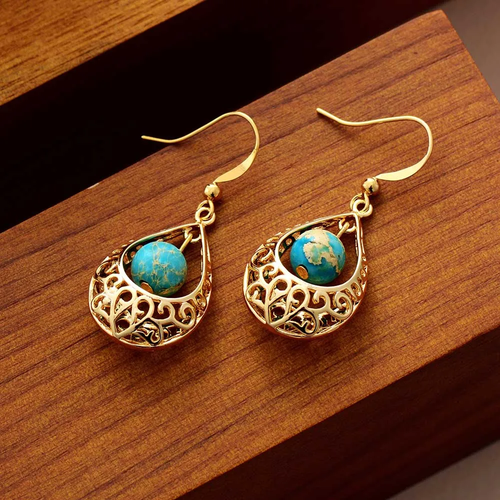Retro Hollow Gold Earth Drop Earrings