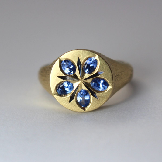 Vintage Gold Ring Adorned with Blue Crystal Flower