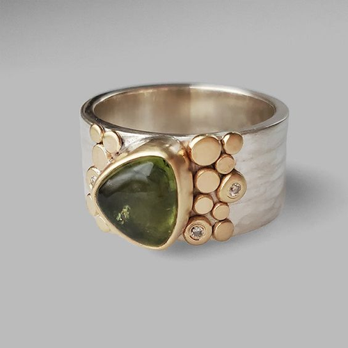 Antique Olive Green Glass Ring with Gold and Silver Accents